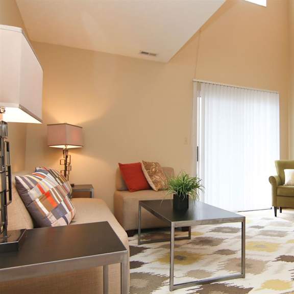 Thumbnail 2 of 13 wonderful living room at Pine Lake Heights Apartments in Lincoln Nebraska