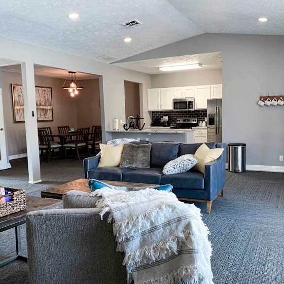 apartment clubhouse with a couch and a table