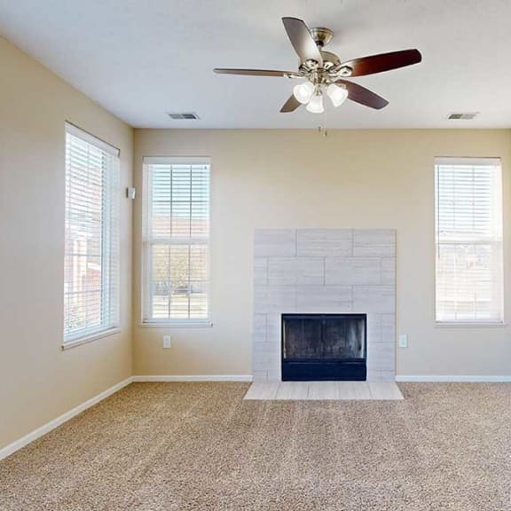 Thumbnail 5 of 28 cozy living room with a modern tiled fireplace and large windows