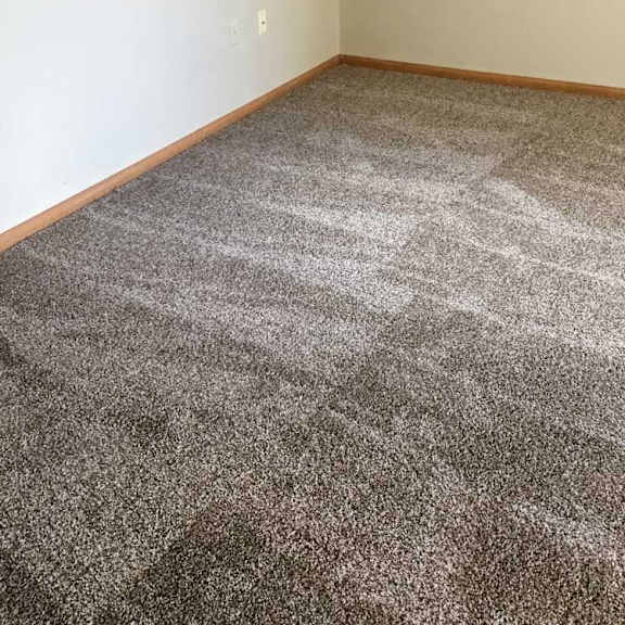 Thumbnail 10 of 11 a loft bedroom with a grey carpet and a beige wall