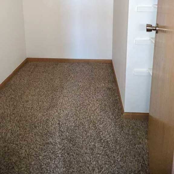 Thumbnail 5 of 24 a walk-in closet with built-in hanging space