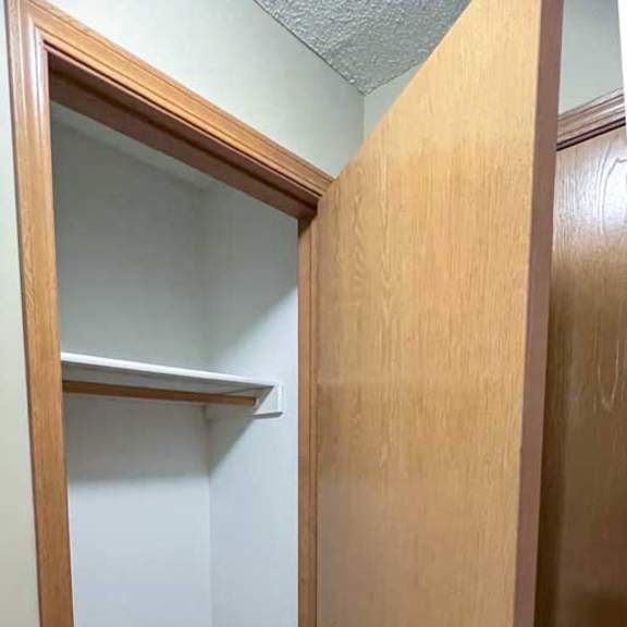 Thumbnail 9 of 9 a coat closet in the entryway