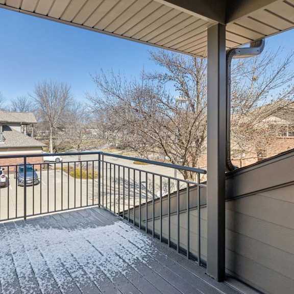 Thumbnail 38 of 38 Private covered balcony overlooking the community and parking area.