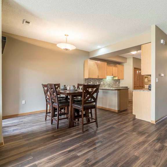 Thumbnail 4 of 21 View of kitchen and dining room at Southwind Villas in southwest Omaha in La Vista, NE, 68128