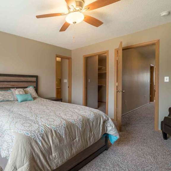 Thumbnail 11 of 21 Master bedroom with walk-in closet and master bath at Southwind Villas in southwest Omaha in La Vista, NE, 68128
