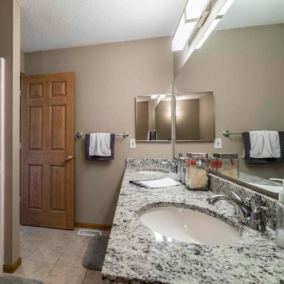 Thumbnail 13 of 21 Master bath with shower and tub at at Southwind Villas in southwest Omaha in La Vista, NE, 68128
