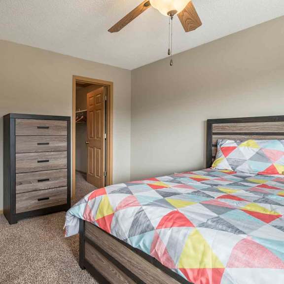 Thumbnail 16 of 21 Second bedroom with walk-in closet at Southwind Villas in southwest Omaha in La Vista, NE, 68128