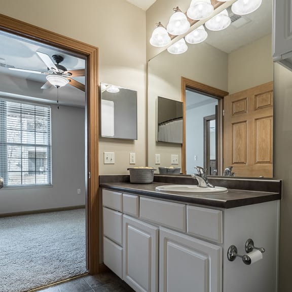 Thumbnail 9 of 9 Bright and spacious bathroom off of bedroom at Stone Creek Villas Apartments