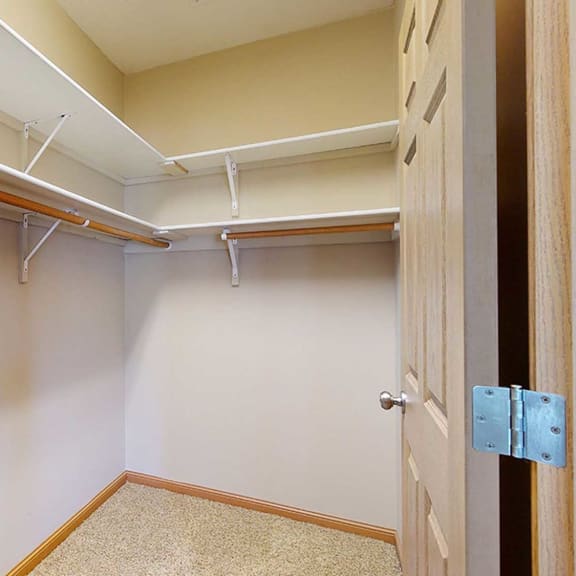 Thumbnail 22 of 28 a walk-in closet with built-in shelves and hanging space