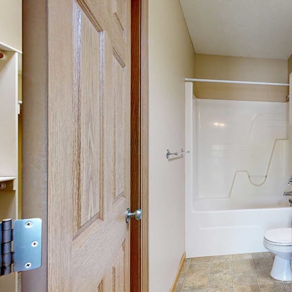 Thumbnail 20 of 32 a bathroom with a toilet and a sink and a shower