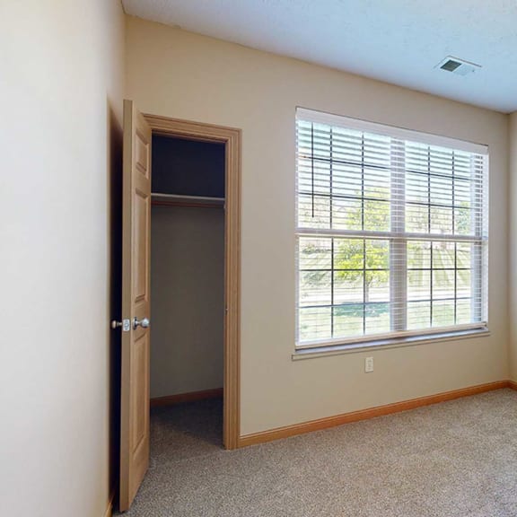 Thumbnail 23 of 32 a room with arrows on the wall and windows