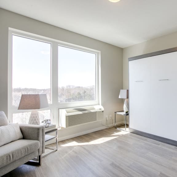 Thumbnail 5 of 11 Contemporary murphy bed in studio unit at The Central apartments near downtown Minneapolis MN 55408