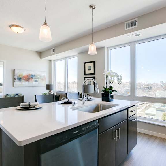 Thumbnail 4 of 15 View of apartment from kitchen island at The Central apartments near downtown Minneapolis MN 55408