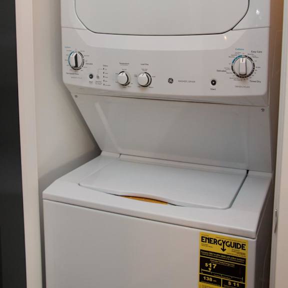 Thumbnail 8 of 8 Stacked washer and dryer unit in a closet