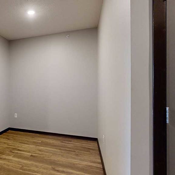 Thumbnail 3 of 17 a sleeping area with privacy walls while maintaining an open-concept design