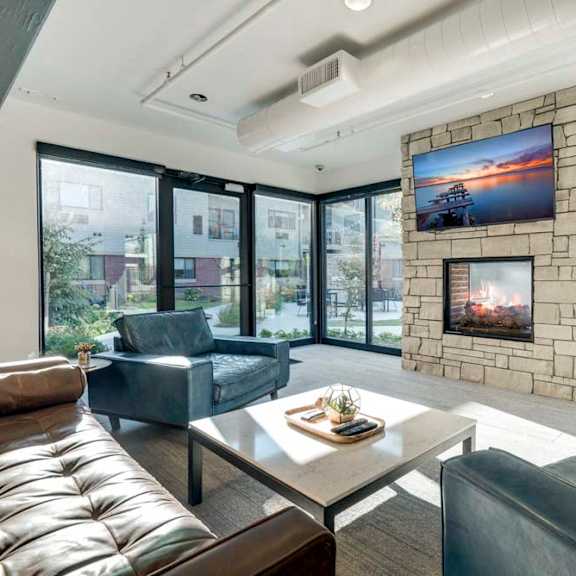 tv lounge with views of pocket park at the conrad near unmc in the blackstone district omaha ne 68105