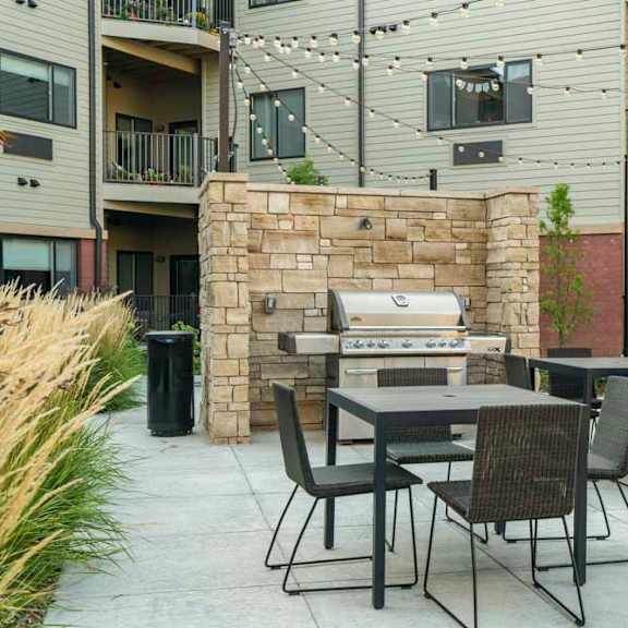 outdoor grill and seating at the conrad near unmc in the blackstone district omaha ne 68105