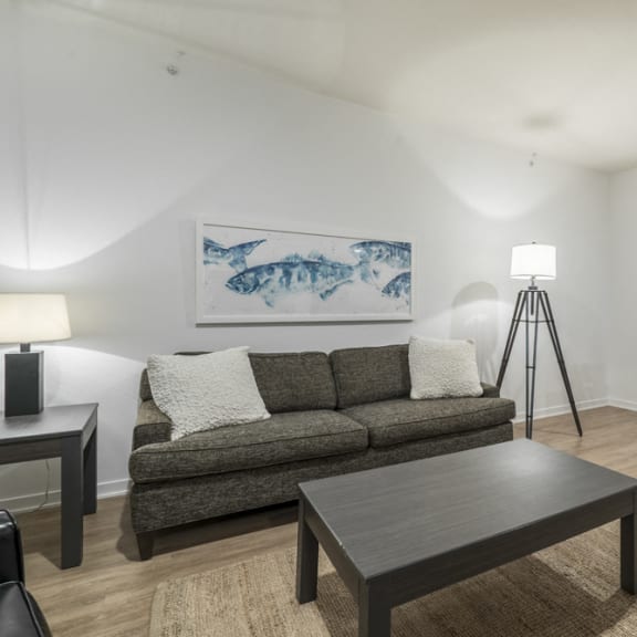 Thumbnail 6 of 8 Living room of spacious studio apartment at The Conrad near UNMC Omaha