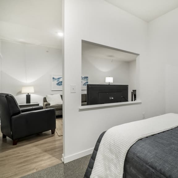 Thumbnail 7 of 8 Studio apartment for rent with view of living room at The Conrad in midtown Omaha NE