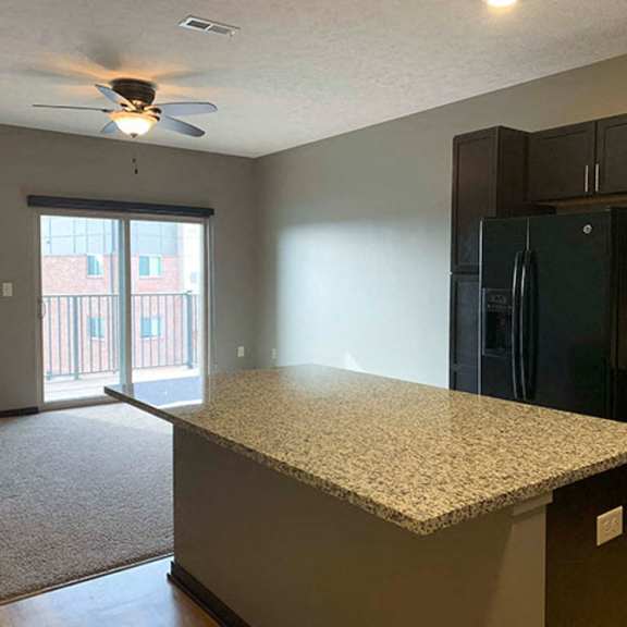 Thumbnail 3 of 21 Comfortably spacious living area in a 1 bedroom apartment for rent at The Flats at 84 best apartments Lincoln NE 68516