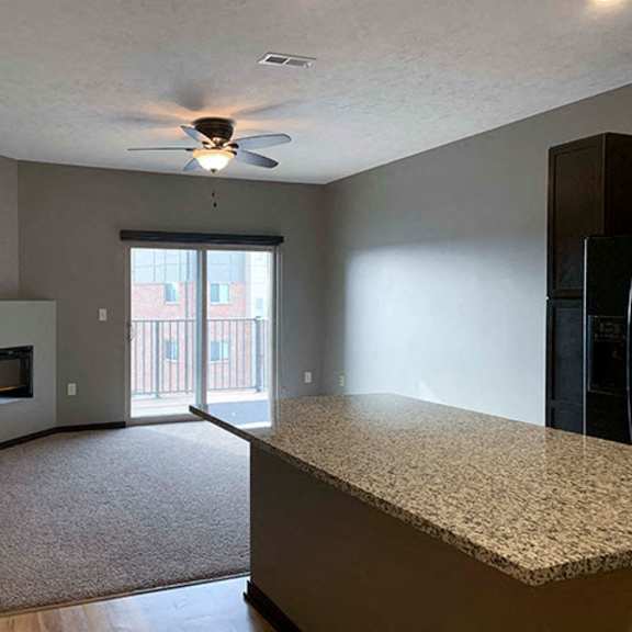 Thumbnail 4 of 21 Comfortably spacious living area in a 1 bedroom apartment for rent at The Flats at 84 best apartments Lincoln NE 68516