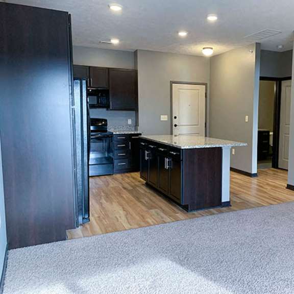Thumbnail 7 of 21 Spacious kitchen with a large island with light granite counter tops  of 1 bedroom apartment for rent at The Flats at 84 best   apartments Lincoln NE 68516