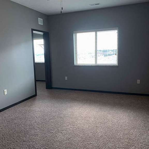 Thumbnail 17 of 21 Large bedroom with walk in closet in a 1 bedroom apartment for rent at The Flats at 84 best apartments Lincoln NE 68516