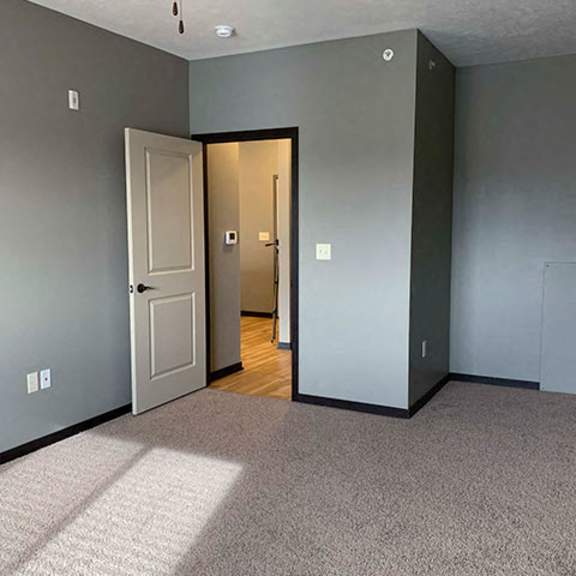 Thumbnail 18 of 21 Large bedroom with ceiling fan and walk in closet in a 1 bedroom apartment for rent at The Flats at 84 best apartments Lincoln NE 68516