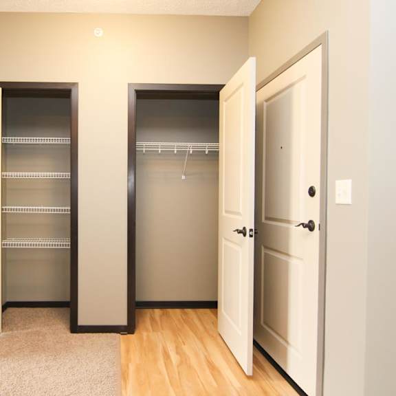 Thumbnail 7 of 14 2 closets with open doors