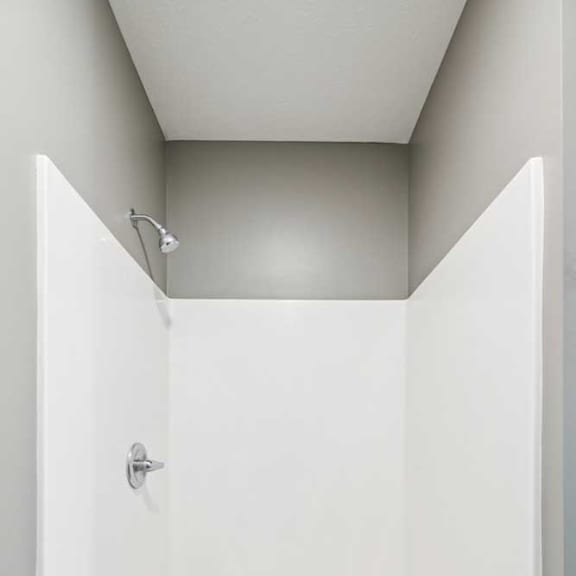 Thumbnail 19 of 23 A white walk in shower insert.