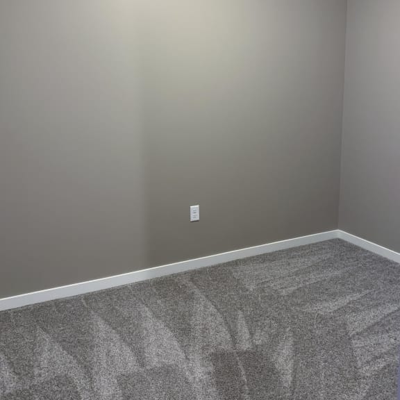 Thumbnail 11 of 16 Small bedroom in the Plum studio apartment at the flats at shadow creek