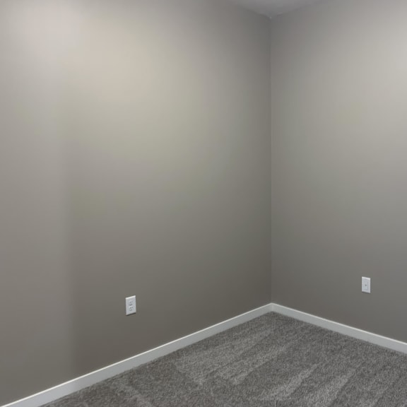 Thumbnail 10 of 16 Small bedroom in the Plum studio apartment at the flats at shadow creek