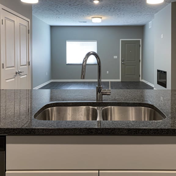Thumbnail 3 of 20 Large kitchen island with granite countertops and sink