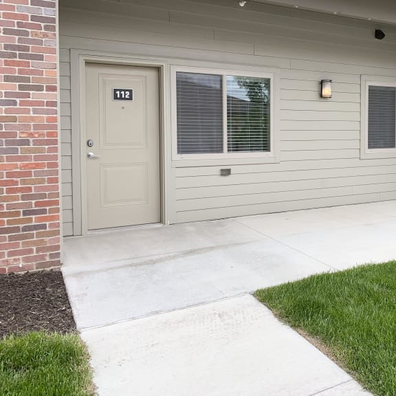 Thumbnail 22 of 23 Outdoor patio area and entrance to apartment The Flats at Shadow Creek in Lincoln Nebraska