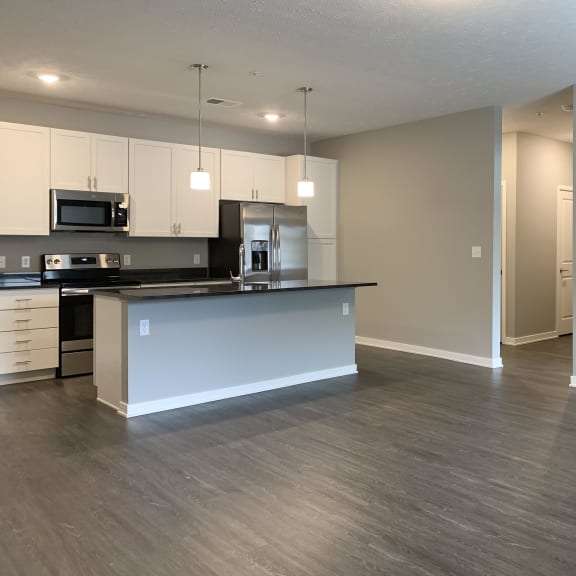 Thumbnail 8 of 23 Dining area with kitchen nearby The Flats at Shadow Creek in Lincoln Nebraska