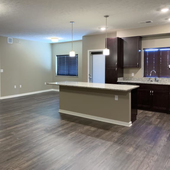 Thumbnail 6 of 15 Large living and dining area with hardwood floors