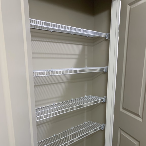 Thumbnail 8 of 15 Storage closet with ample shelving space