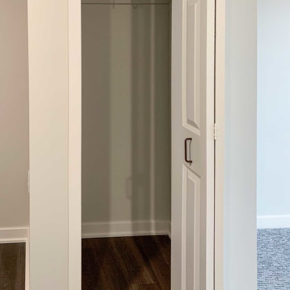 Thumbnail 19 of 24 a coat closet in the main entry