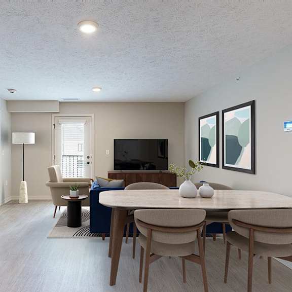 Thumbnail 11 of 30 A living room and dining space with a TV, chair, couch, and table with four chairs