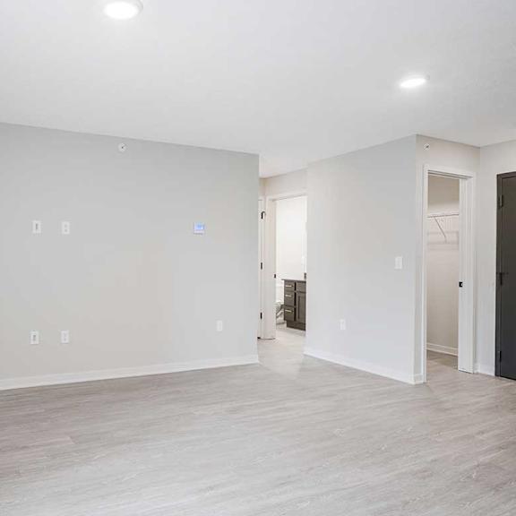 Thumbnail 15 of 30 A living room with light luxury vinyl hardwood floors