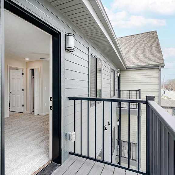 Thumbnail 10 of 25 the balcony with exterior lighting and electrical outlet