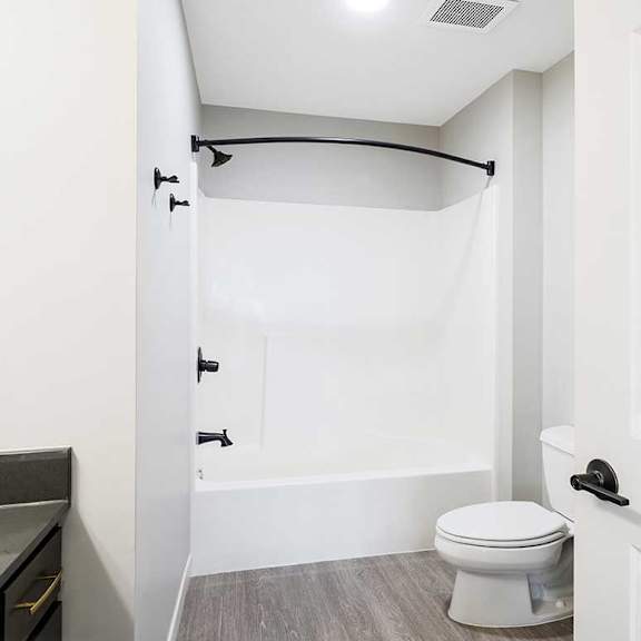 Thumbnail 15 of 25 a bathroom with a toilet and a shower