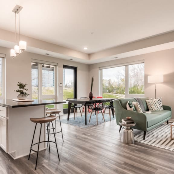 Thumbnail 5 of 18 Kitchen Island and Living Room View at The Preserve at Normandale Lake