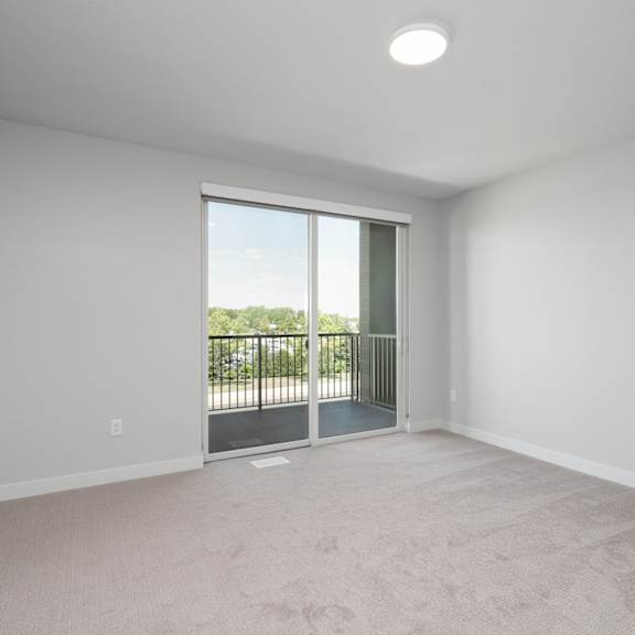 Thumbnail 7 of 15 Master bedroom with access to the outdoor balcony