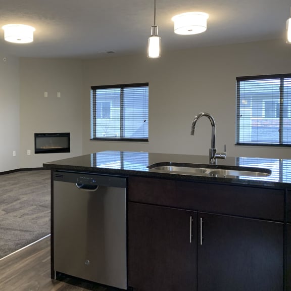 Thumbnail 7 of 23 View of the living area from the kitchen at the villas at mahoney park