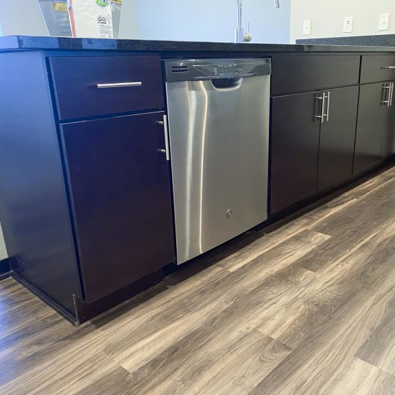 Thumbnail 4 of 16 Kitchen counter with ample cabinet space and dishwasher below