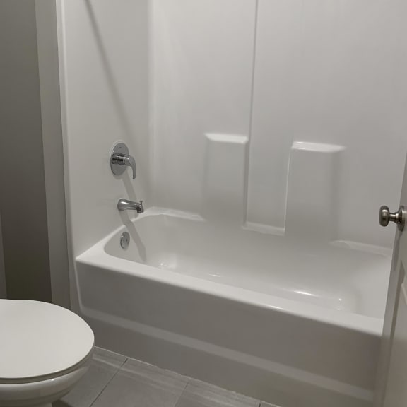 Thumbnail 21 of 26 bathroom with white shower and tub combo