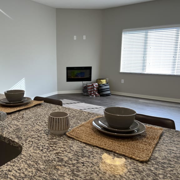 Thumbnail 6 of 8 Beautiful granite countertops in the kitchen of the glacier floorplan at the villas at mahoney park