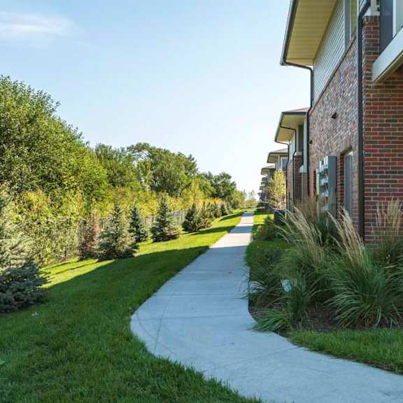 walking paths leading to the buildings at the villas at mahoney park