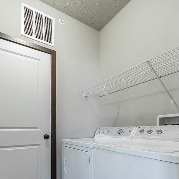 Thumbnail 7 of 11 Full-sized washer and dryer in laundry room at the Villas at Wilderness Ridge in Lincoln Nebraska